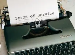 Terms of Service Letter being typed on a typewriter. The Legal Director